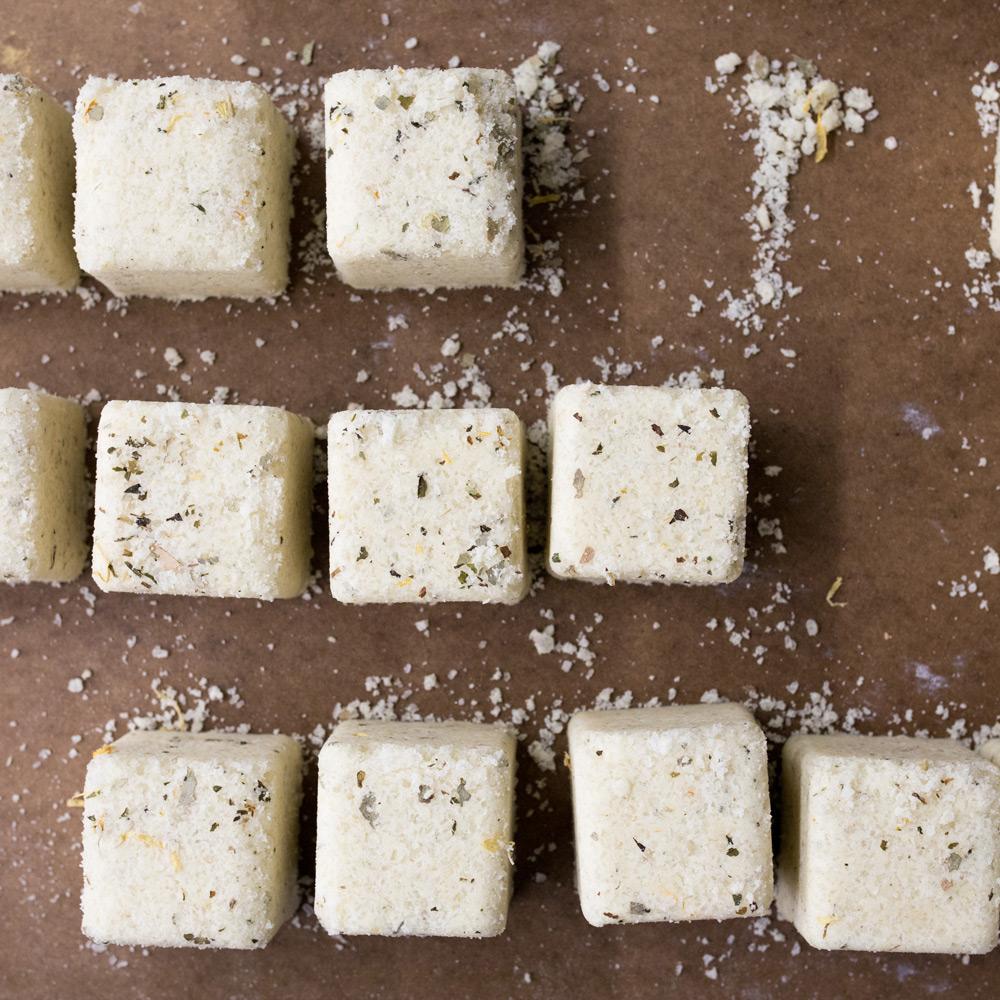 Overhead shot of Muscle Salt Blocks laid out on a brown background